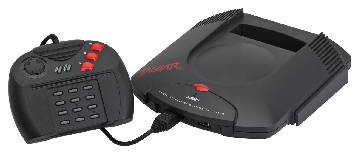 Atari Jaguar console with its standard black controller and numeric keypad