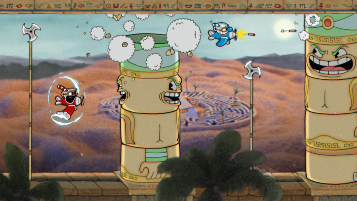 Cuphead and Mugman fly between tall columns during the Djimmi the Great encounter