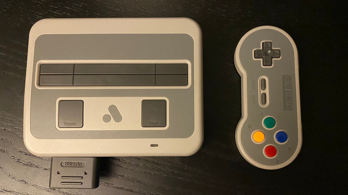 Original Analogue Super Nt with an 8BitDo controller and receiver, photographed in March 2021; not the new Super Nt+