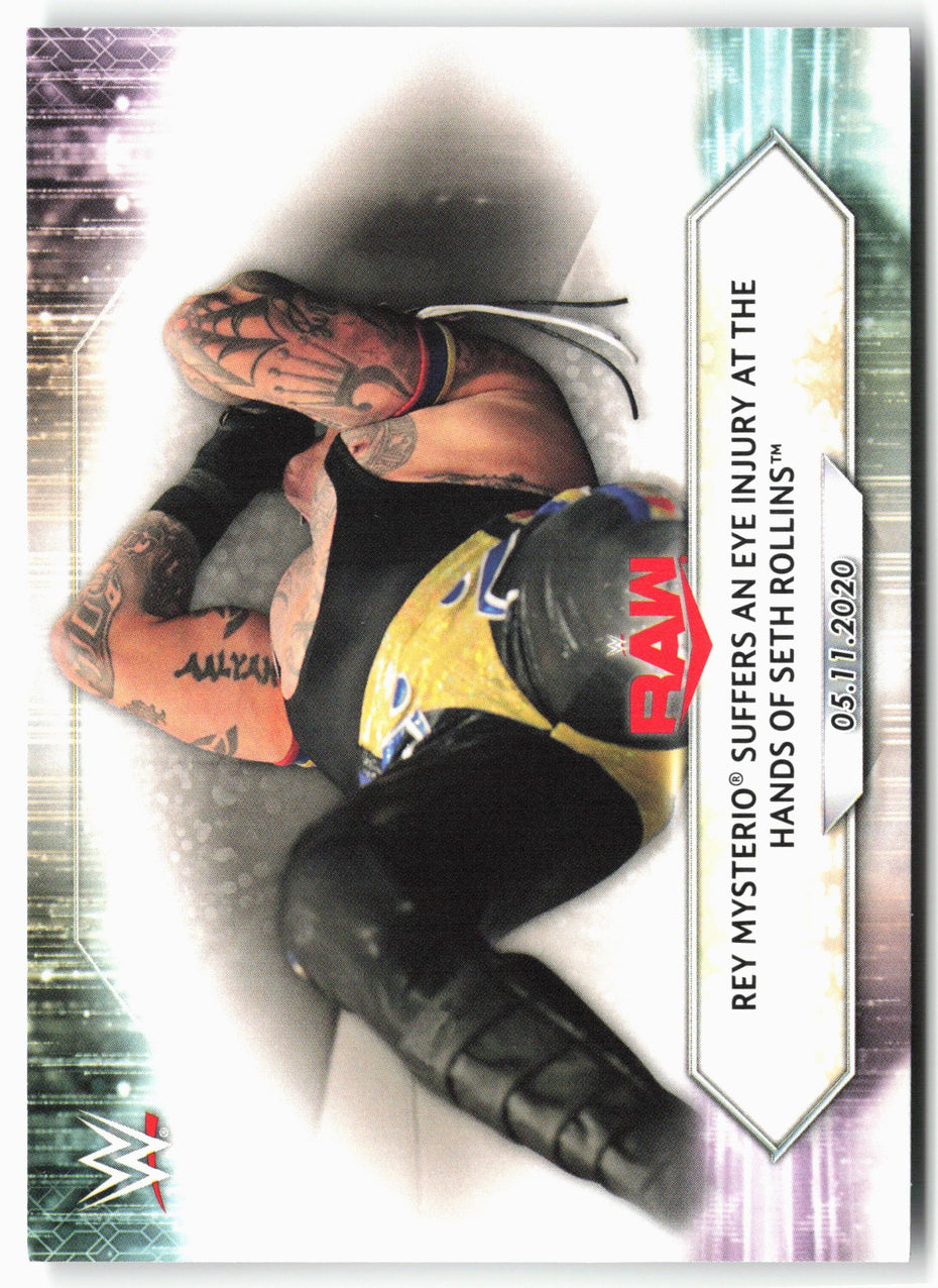 2021 Topps WWE #71 Rey Mysterio Suffers an Eye Injury Seth Rollins