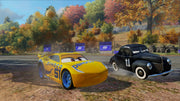 Cars 3: Driven to Win | Xbox One | gameplay screenshot | Side-by-side racing through an autumn circuit | source=official Xbox BZKS084ZSXJ4 | asset=c37fc0b0-7c70-4376-b200-440acdab7b80